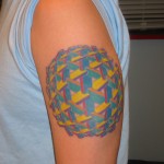 Custom psychedelic color impossible geometry tattoo by Adal at Majestic NYC