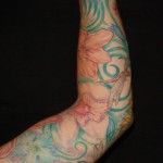 color orchid sleeve tattoo by Majestic