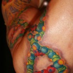 psychedelic color DNA molecule sleeve by Majestic tattoo