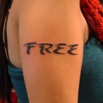 free font text arm tattoo by Adal
