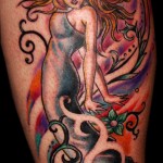 psychedelic flower hippie girl with wind spirals on calf by adal
