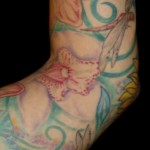 Custom color orchid lily dragonfly sleeve tattoo