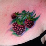 color realism raspberries fruit boob tattoo