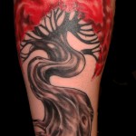 color black and grey tree sleeve tattoo