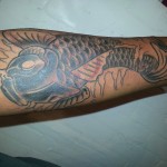 Second stage of tattoo cover up by Adal at Majestic
