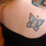 before image butterfly cover up tattoo