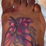 Butterfly tattoo cover up on foot - after