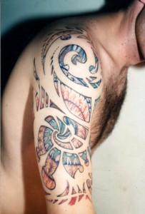 color fractal spiral pattern shoulder tattoo by Adal