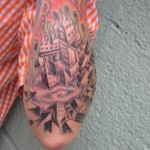 burning city tattoo sleeve