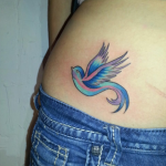 colorful sparrow bird hip tattoo