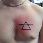 sword through triangle tattoo