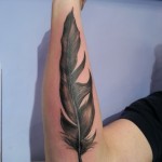 large feather forearm arm tattoo