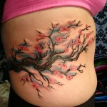 cherry blossom tattoo feminine ribs