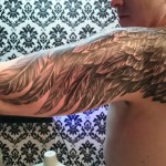 wings tattoo back and shoulder black and grey