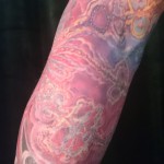 psychedelic red tattoo sleeve