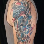 abstract dragon tribal cover up blue tattoo