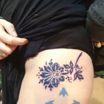 feminine floral hip tattoo arrows
