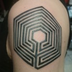 optical illusion geometric shoulder tattoo