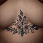 Best Chest tattoo for NYC women by Adal Ray